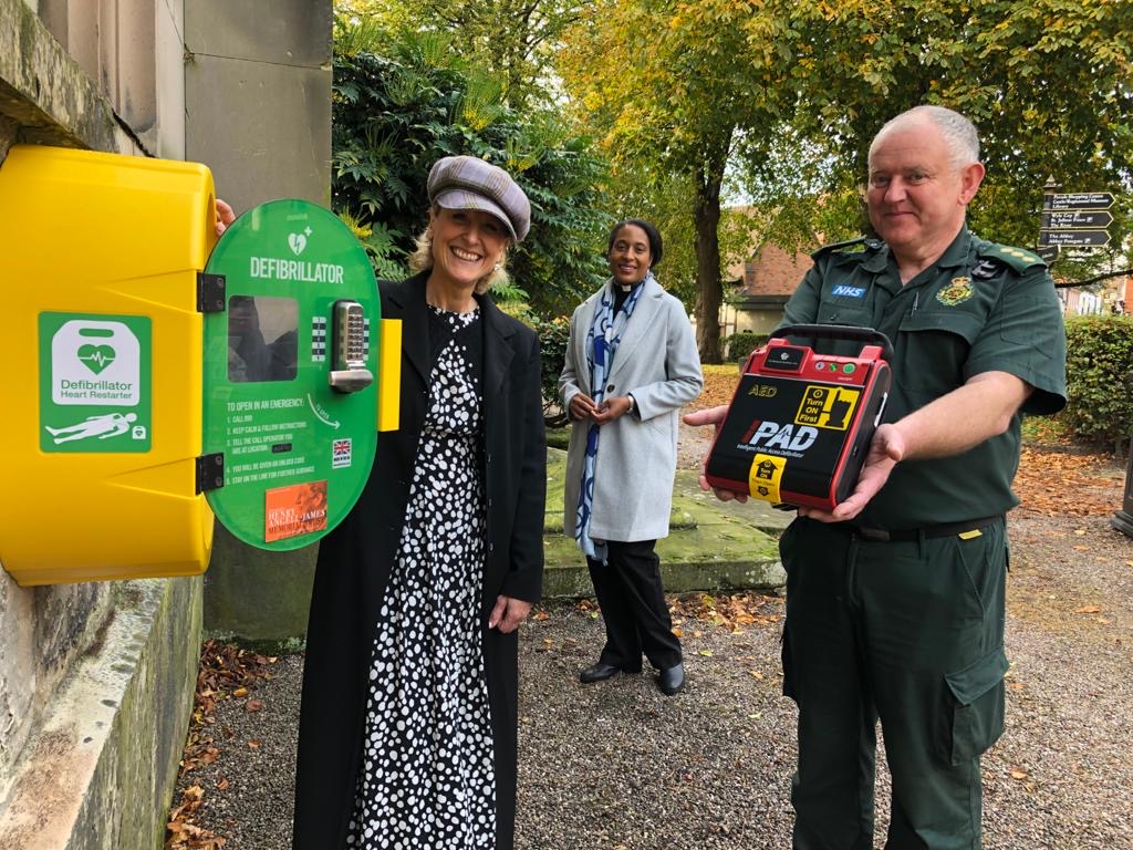 Sally Angell-James with West Midlands Amubulance Service’s Cliff Medlicott and Rev Yejide Peters of St Alkmunds Church launching the charity in Shrewsbury.